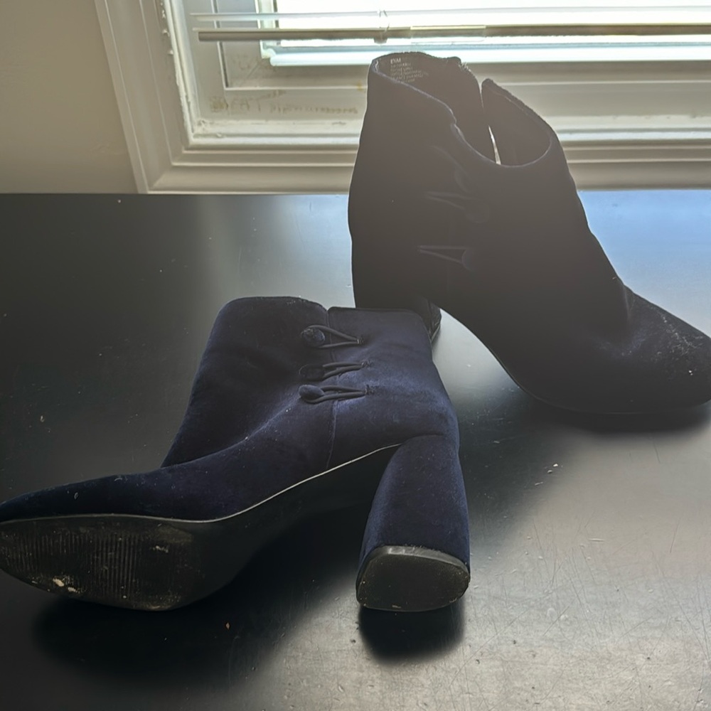 Dark blue suede booties with buttons